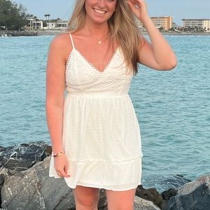 White beachy V neck dress.